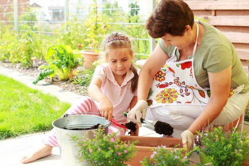 Management reviewing anti-slavery policies in landscaping operations